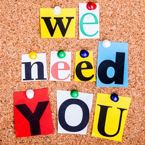 Prikbord met tekst: we need you.