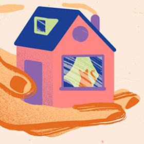 hand met huis