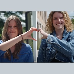 Mare en Esmee vormen hart met handen