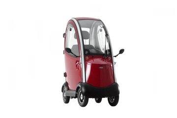 Beeld van: Scootmobiel met dakje